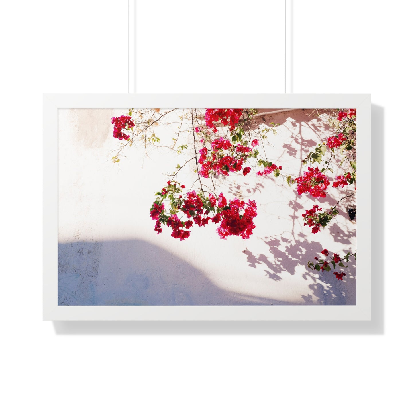 Photography art titled "Alleyway Roses." The framed photography wall art depicted is 30"x20" and is pictured in a white frame option. 

Photo of pink flowers in golden light. 

Mexico Print Series. Oaxaca, Mexico, 2024.

Original photography artwork by Nick Sparks.  