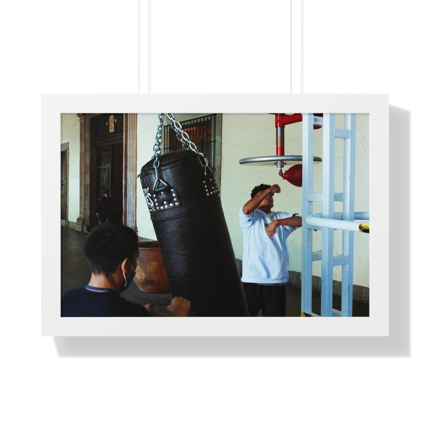 Photography art titled “Boys Boxing.” The framed photography wall art depicted is 24"x16" and is pictured in a white frame option. 

Photo of two boys boxing outdoors.

Mexico Print Series. Oaxaca, Mexico, 2024.

Original photography artwork by Nick Sparks.  