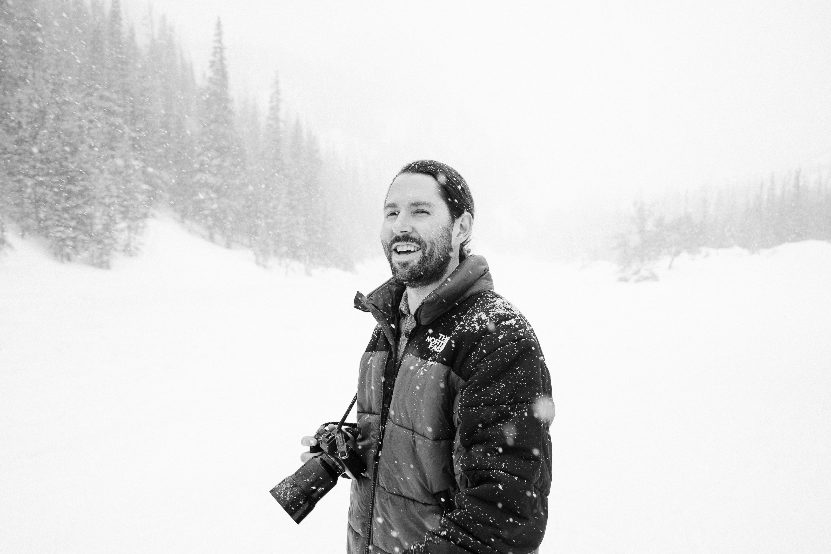 Picture of photographer Nick Sparks in a snowy outdoor scene. With Nick Sparks Print Store he creates ready to hang wall art. 